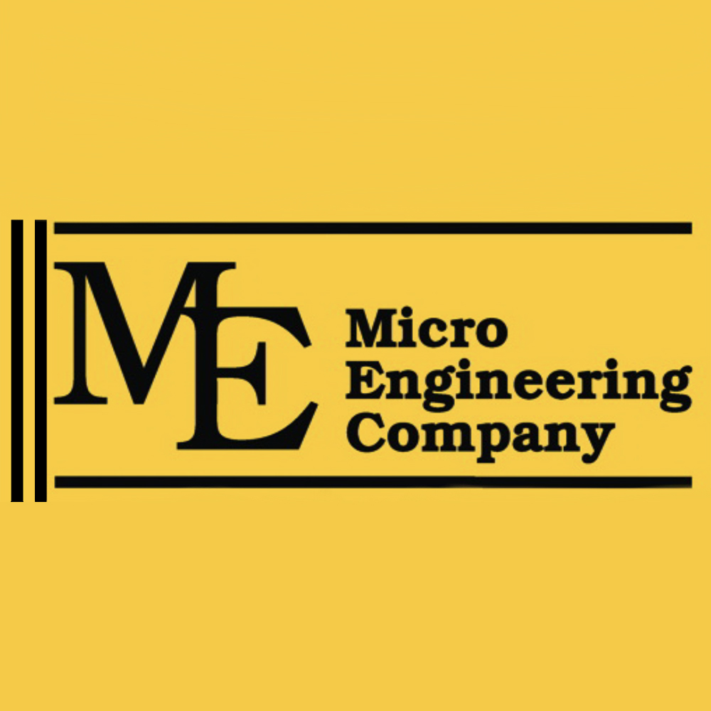 Micro Engineering acquires Tomalco Track: The logo for Micro Engineering Company, which features black text against a yellow background