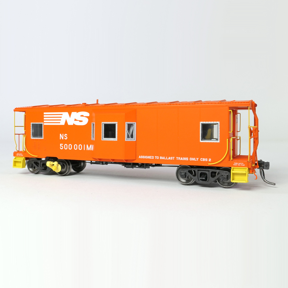 An orange model caboose