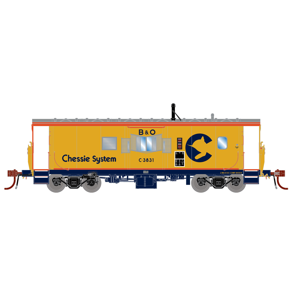 A yellow model caboose