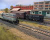 An HO scale GP7 running around its train