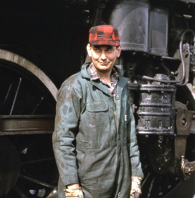 Man next to locomotive