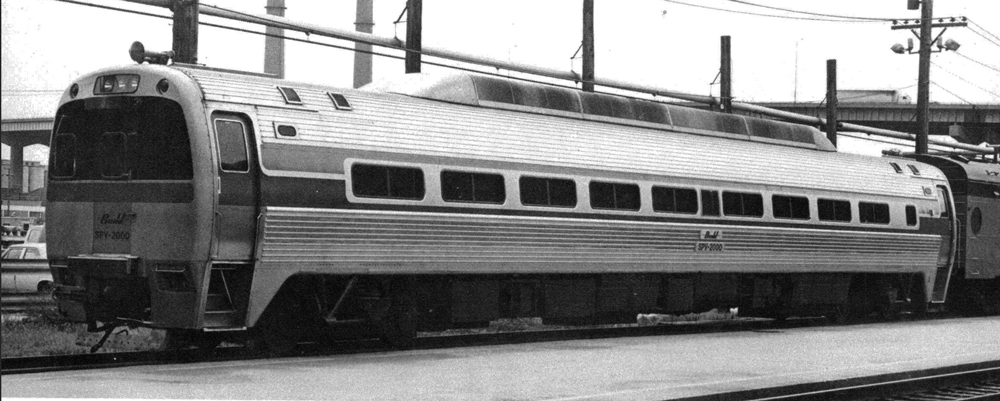 Cylindrical Budd SPV-2000 diesel self-propelled passenger car at train station