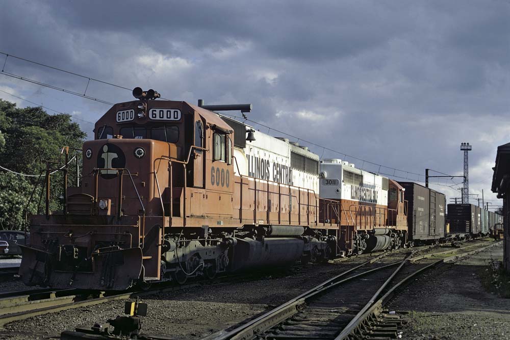 Orange-and-white diesel locomotive Illinois Central SD40 6000