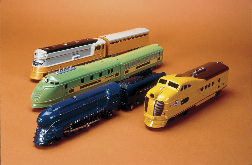  three old toy train engines