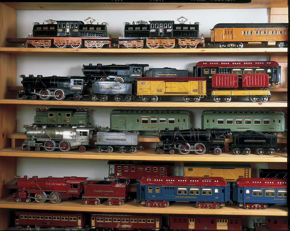 shelf of old toy trains