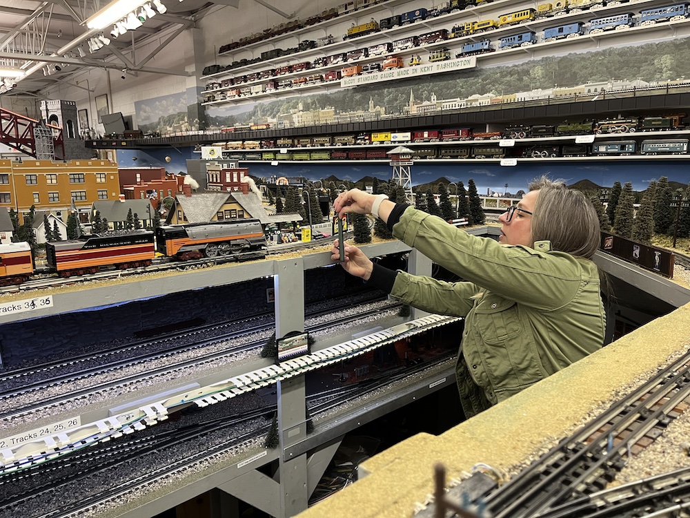 woman shooting photograph