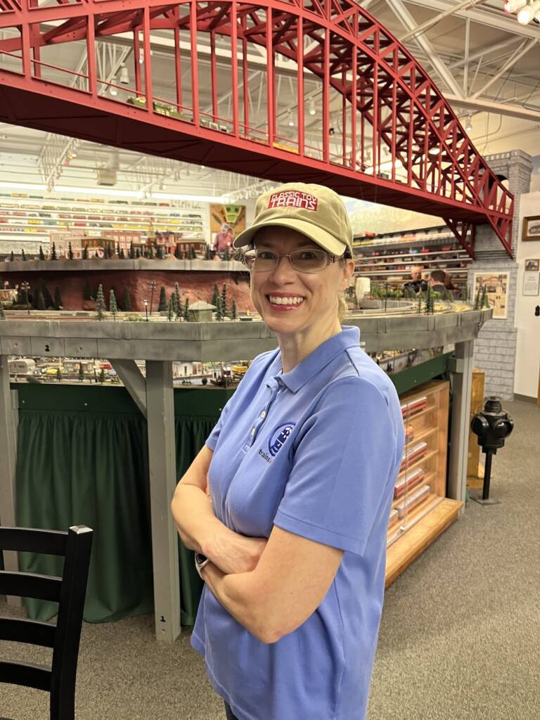 woman in hat smiling