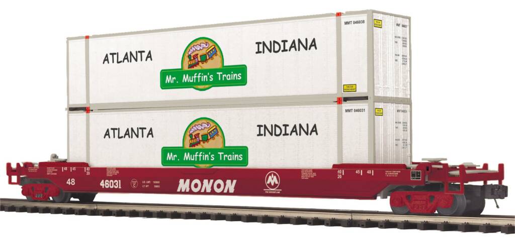 model rolling stock with green and yellow graphics