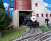 train with ore cars leaving mine
