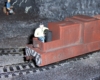 : figure in model train engine