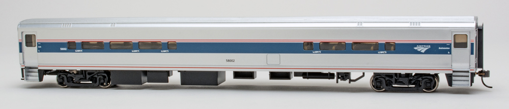 Color photo of HO scale passenger car painted silver with red, white, and blue graphics