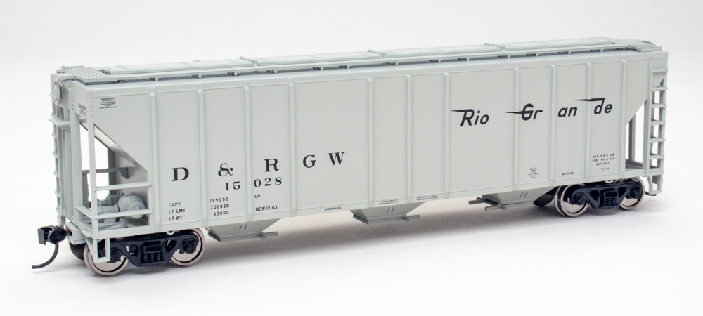 Color photo of HO scale covered hopper painted light gray with black graphics