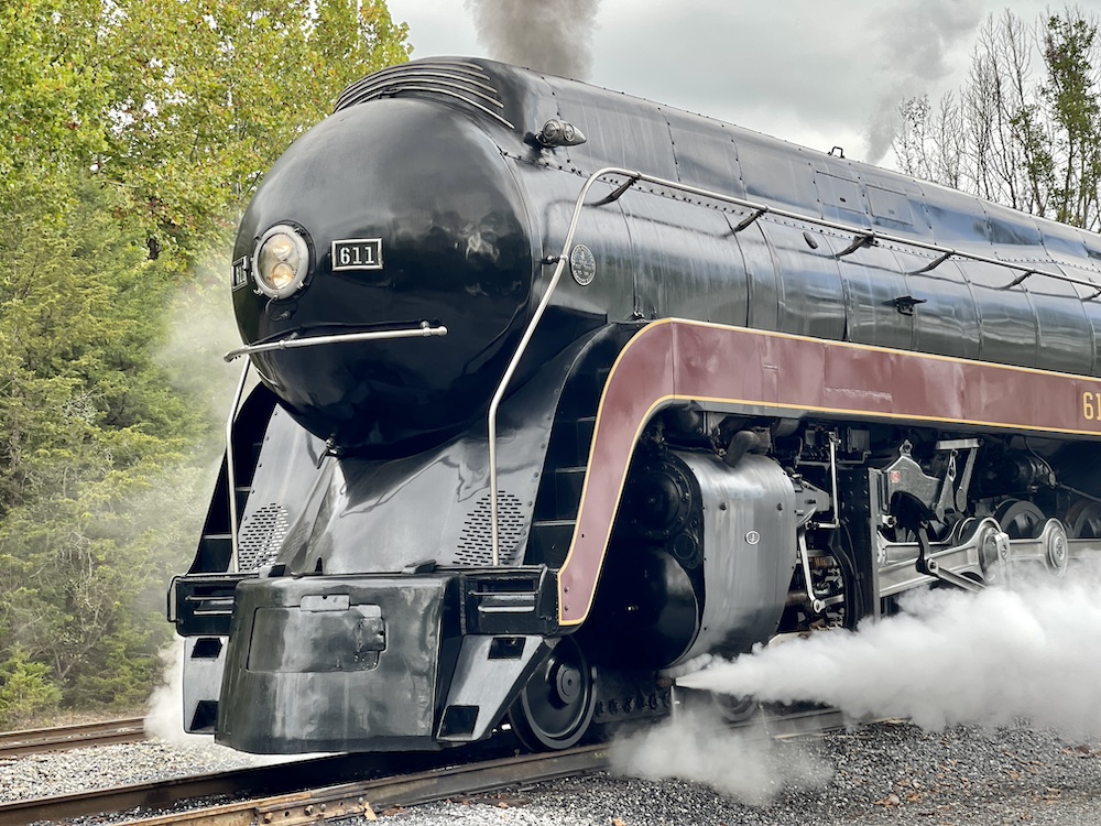Steam locomotive sitting on a cloudy day