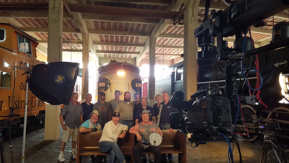 Group photo in a vintage roundhouse
