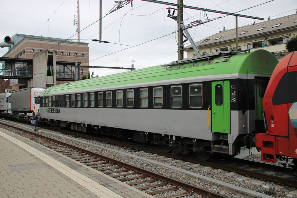 Green and white sleeping car