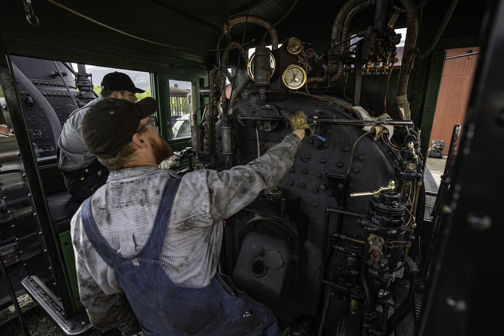 Two men in locomotive cab