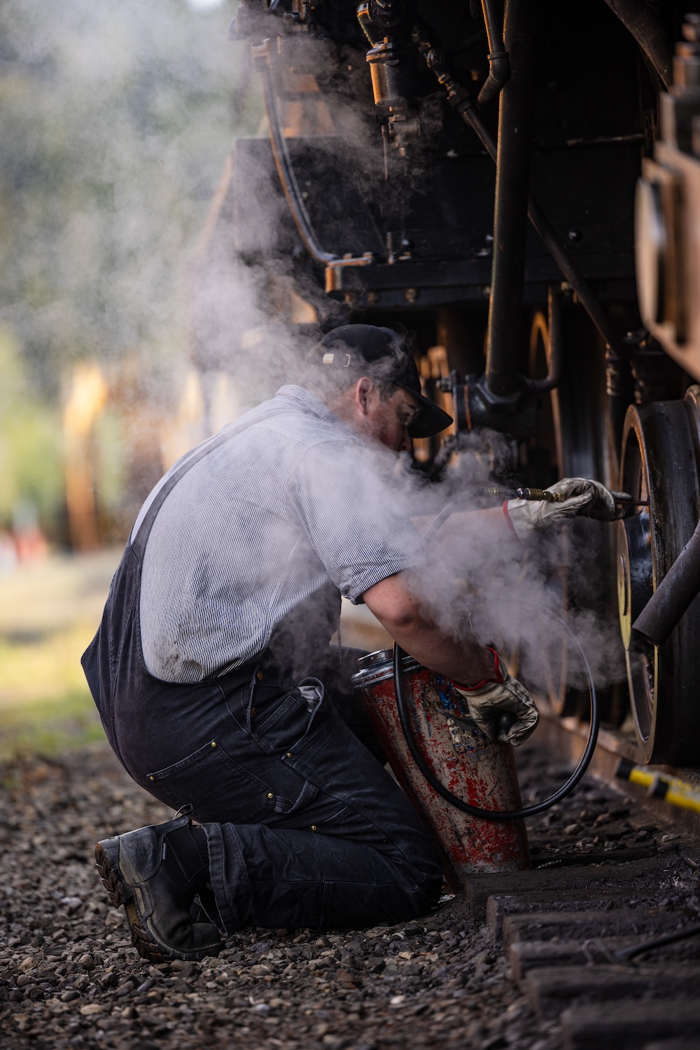 Man working on locomotive