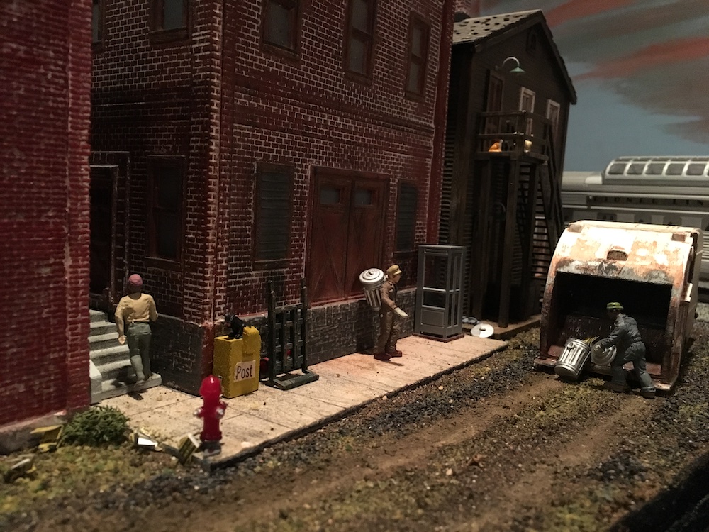  dark alley scene with garbage truck on layout; add realism to your layout