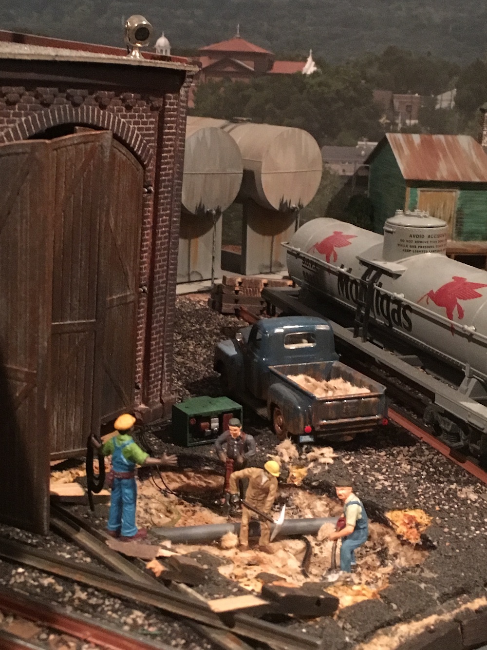 scene with workers on layout; add realism to your layout