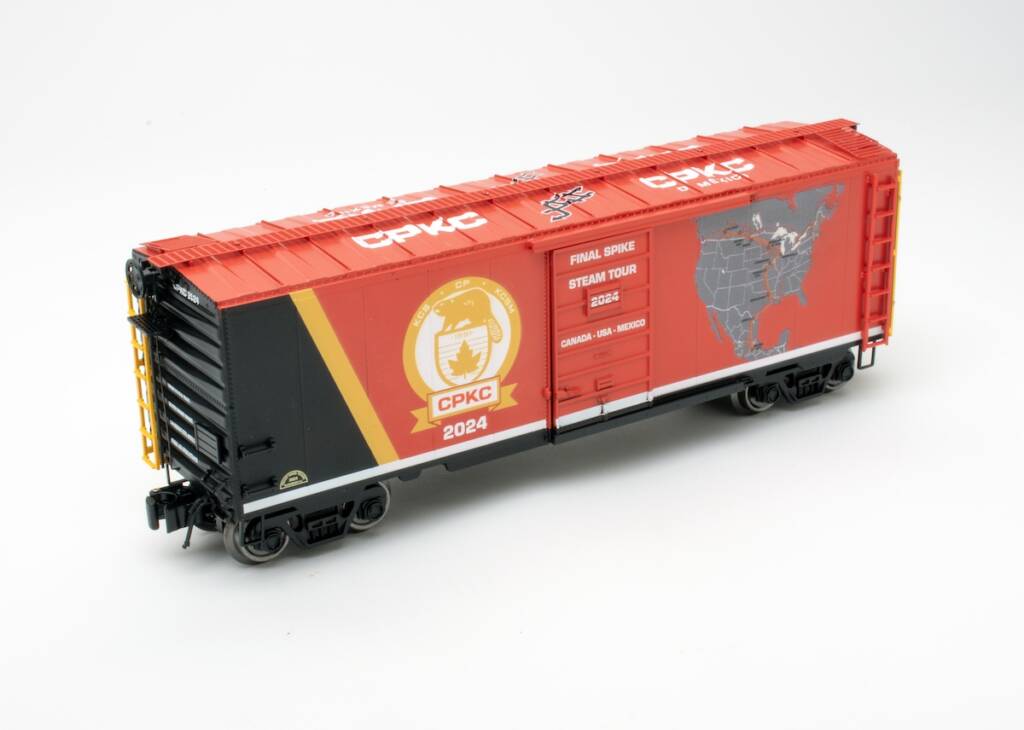 red, black, and gray model boxcar
