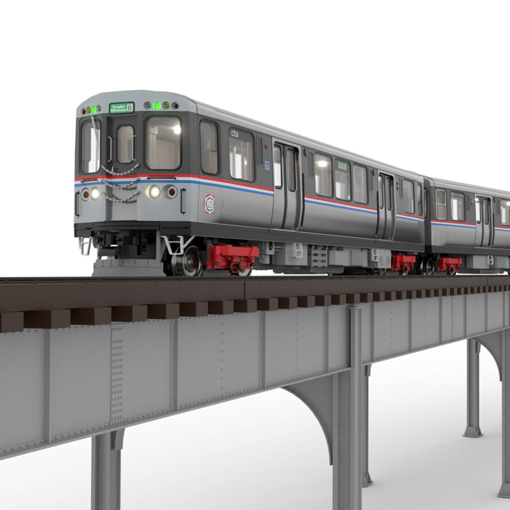 A model passenger train on elevated track
