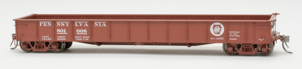 Color photo of HO scale freight car painted mineral red on white background