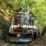 High-nose diesel with ornate blue, black, white, and gold paint scheme