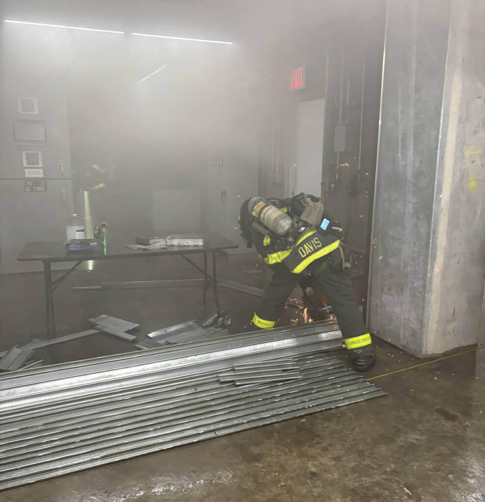 Firefighter working in smoke-filled area
