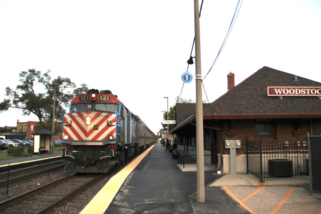 Commuter train arrives at station