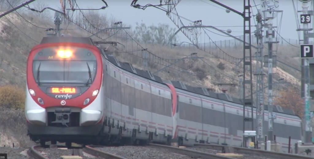 Red and white electrified passenger train
