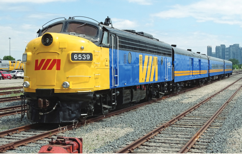 Blue and yellow passenger train