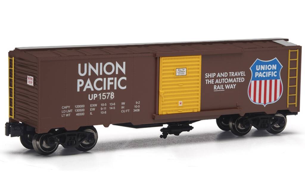 brown boxcar with yellow door