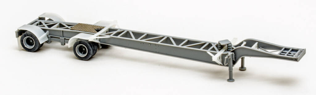 Color photo of undecorated HO scale trailer on white background