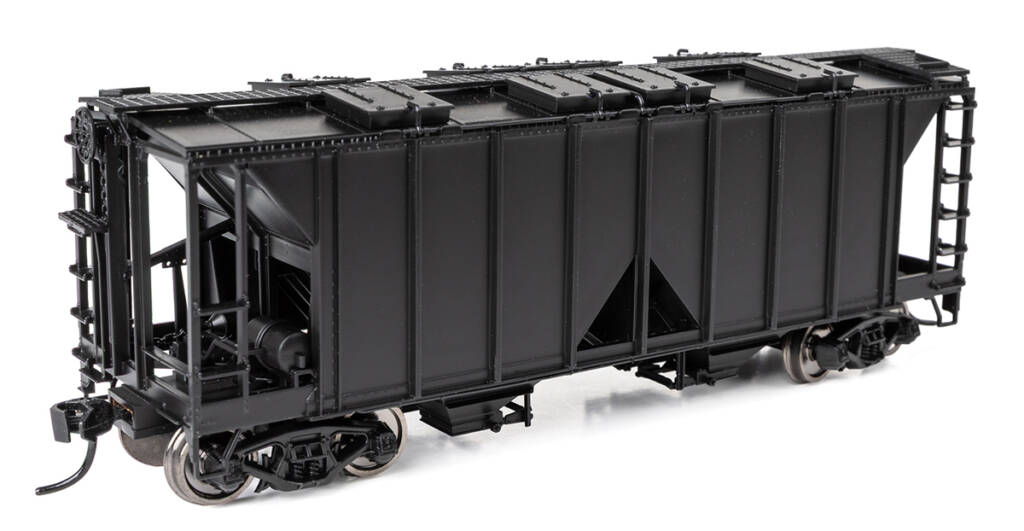 Color photo of HO scale two-bay covered hopper painted black without graphics on white background. 