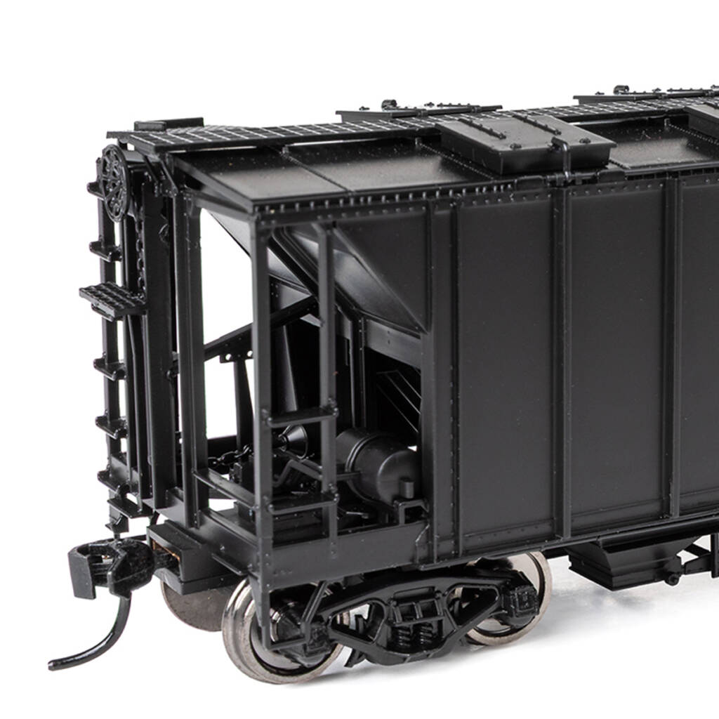 Color photo of HO scale two-bay covered hopper painted black without graphics on white background.