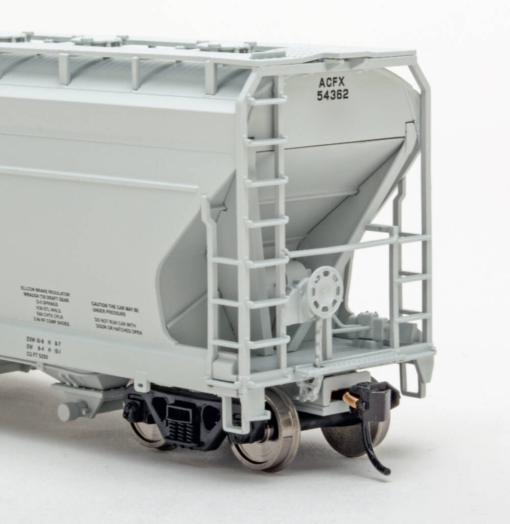 Color photo showing B end of HO scale covered hopper on white background.