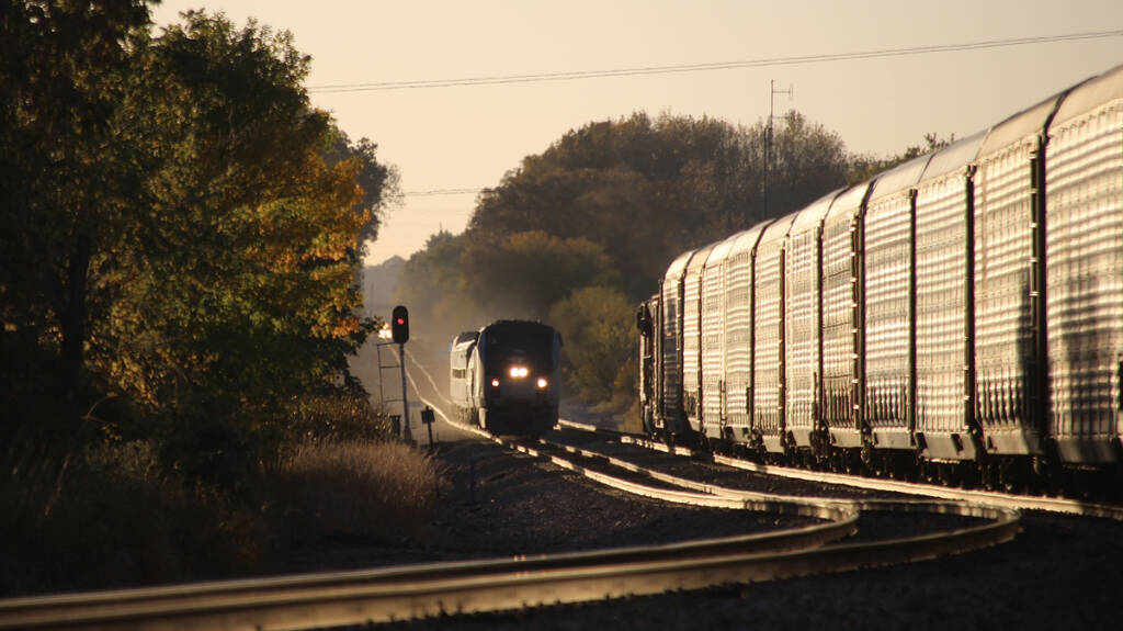 Trains meet in glint lighting