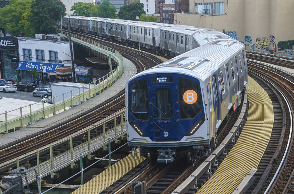Subway train on curve in open-air segment