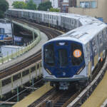 Subway train on curve in open-air segment