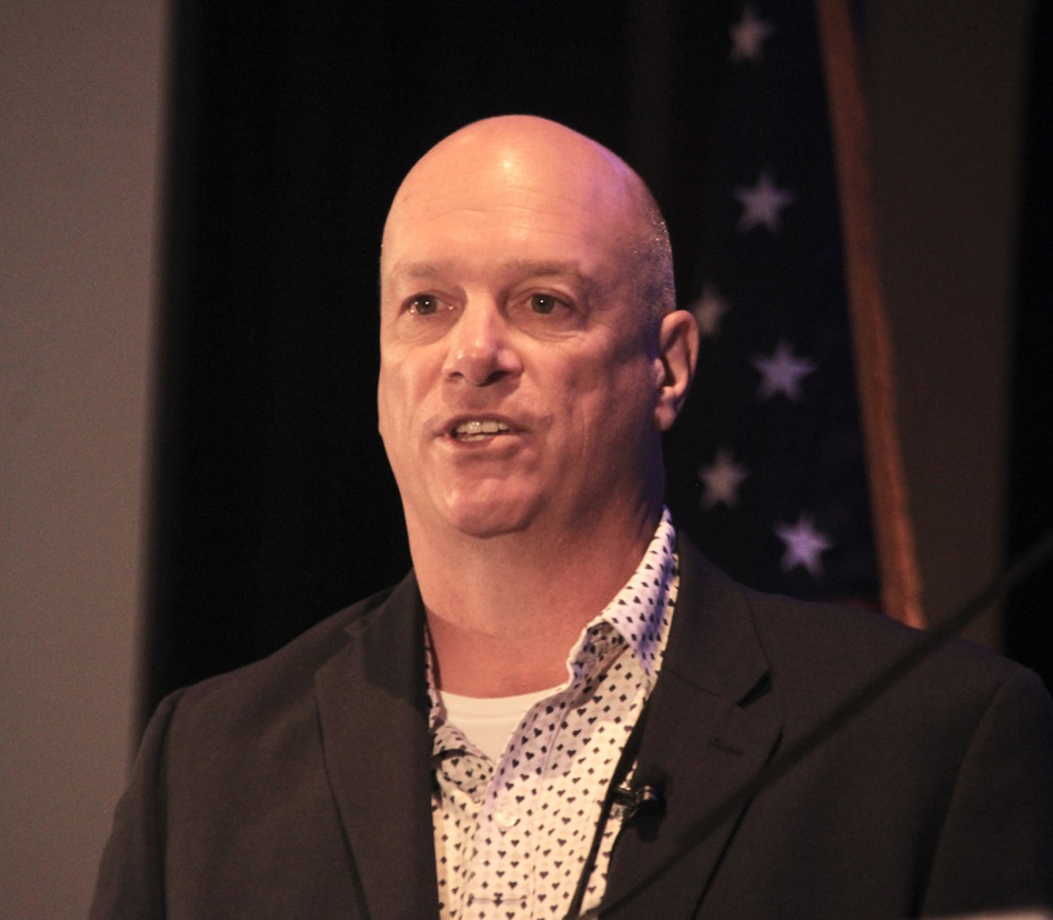 Man speaking to conference