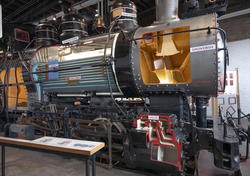 A cutaway view of the interior of a steam locomotive in a railroad museum