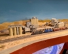 Freight train passes a propane facility