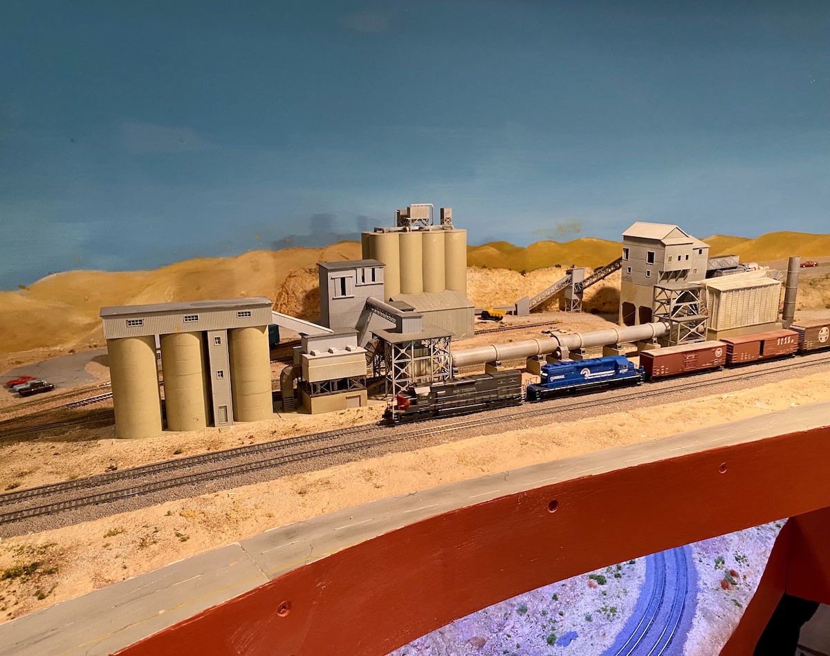 Freight train passes a propane facility