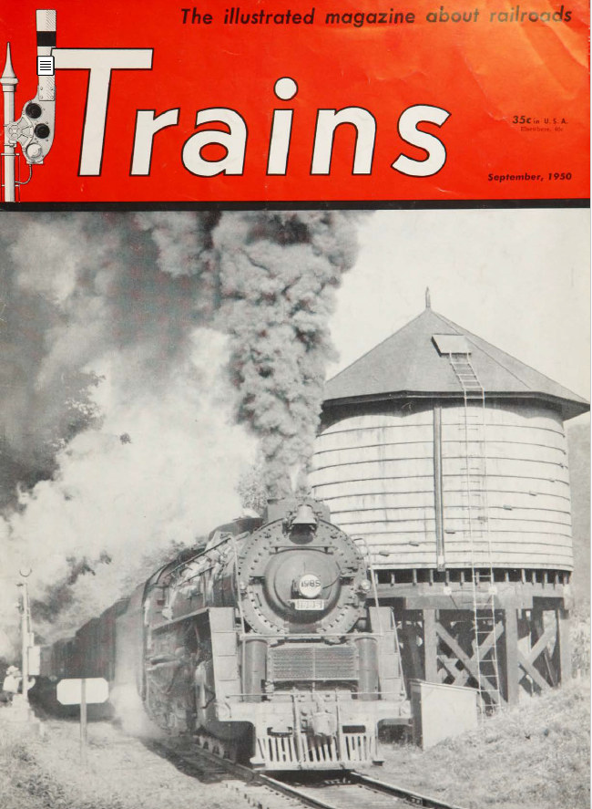 Magazine cover shows a steam locomotive passing a water tanks. The word Trains appears in white on a red box