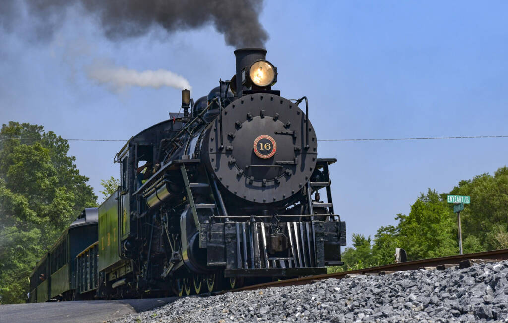 Low-angle view of steam locomotive