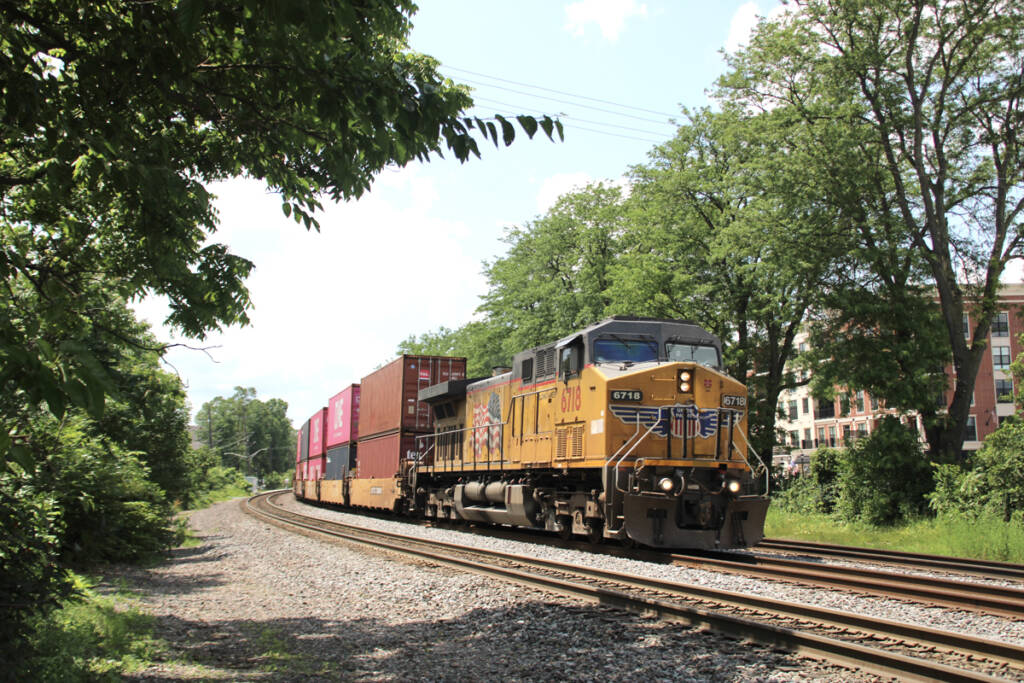 Single locomotive with train of containers