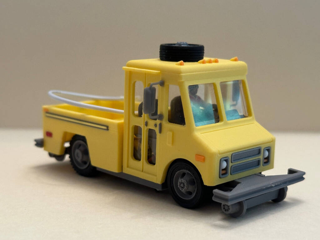 yellow model rail vehicle