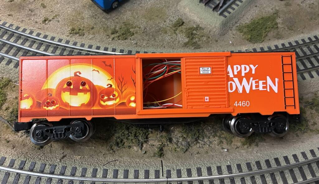 orange boxcar with door open