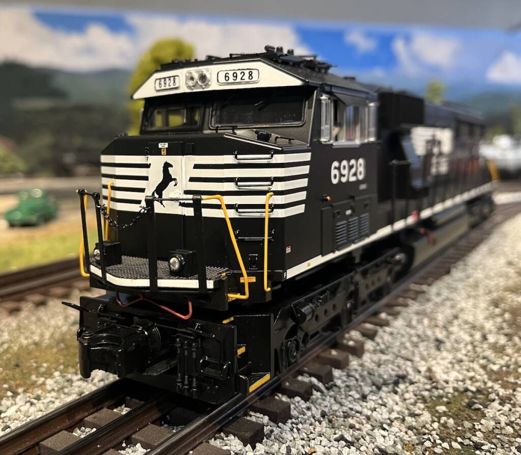 front of black and white model locomotive