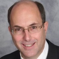 Head shot of man with glasses